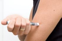 Close-up of injecting insuline